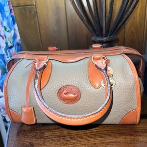 BRAND NEW Dooney & Bourke shoulder bag with strap included!